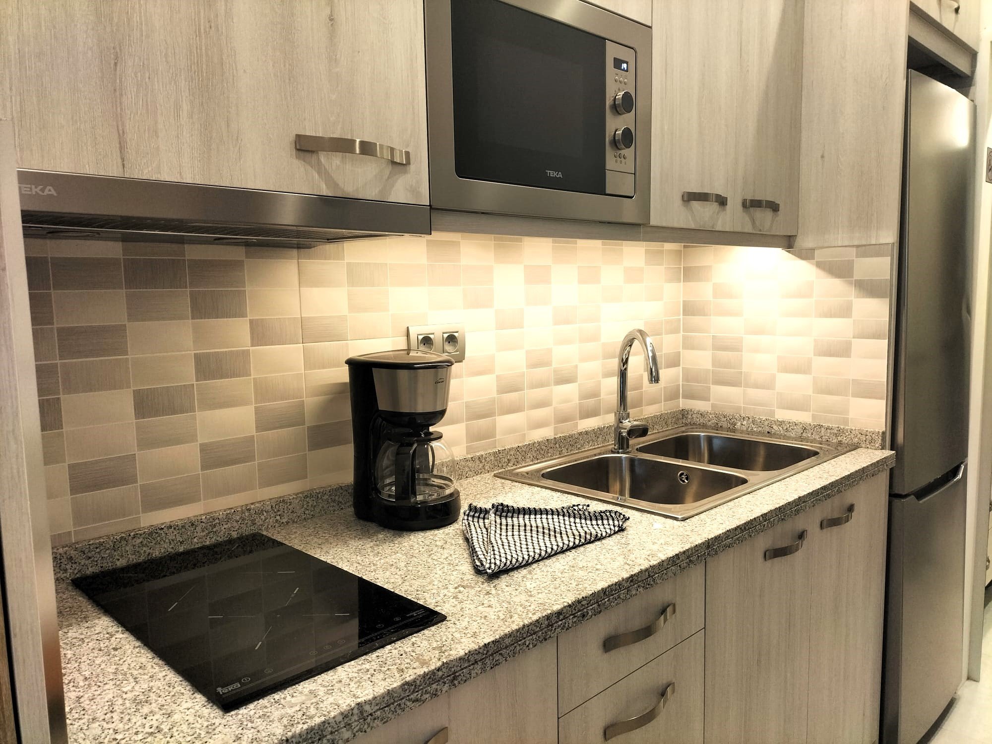 Maravilloso estudio totalmente renovado y moderno en Arguineguin, directamente en la playa, en alquiler